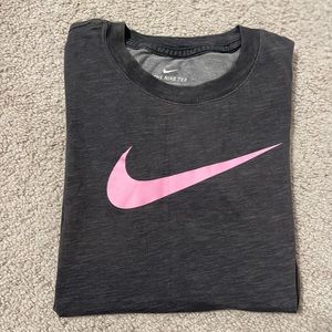 Good condition, small size t shirt, nike wear, pink and grey t shirt.